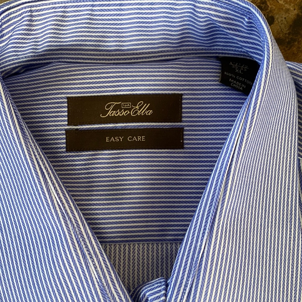 Man’s dress shirt a size 17 1/2 sleeve length 32-33. axle
